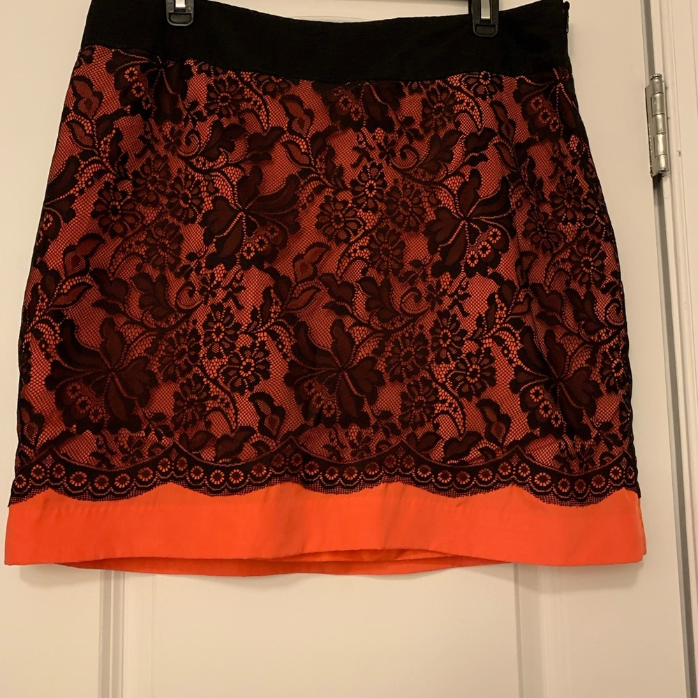 Mini skirt from the limited- size 14. Orange with lace detail